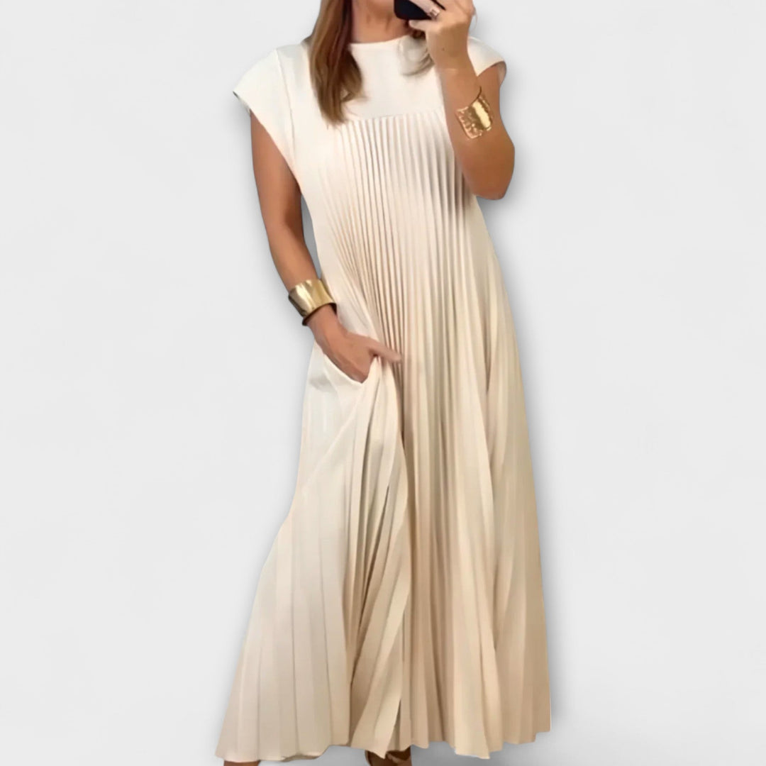 Zairelle – Elegantne Plisirane Obleke