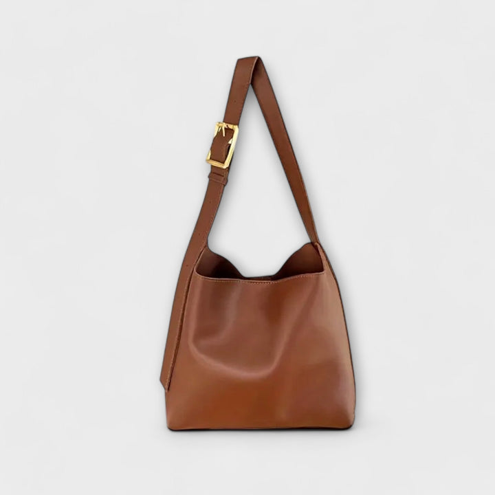 Cécile. – Elegantna usnjena torba čez ramo